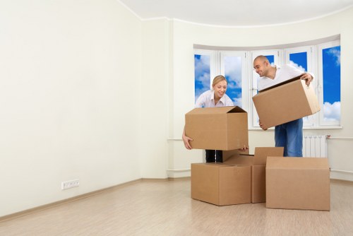 Protective wrapping and planning for a piano move in Barnes