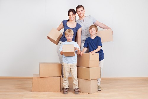 Professional movers handling furniture during Barnes house removals