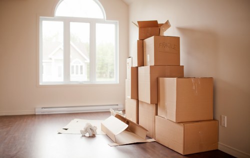 Professional man with a van helping with household move in Barnes