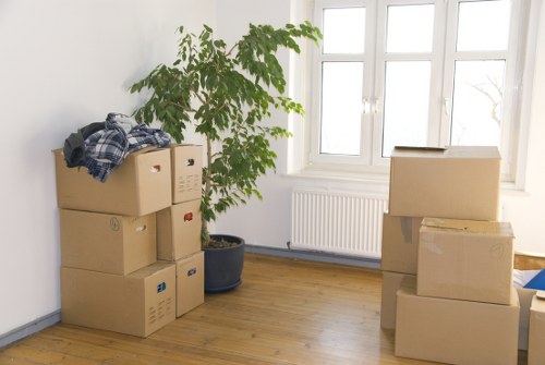 Staff using protective equipment during a house move