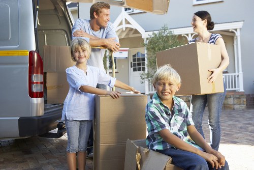Moving boxes and luggage inside a Barnes home