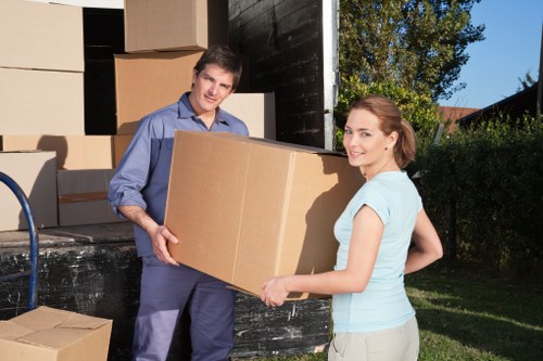 Newly arranged boxes and furniture after house removals in Barnes
