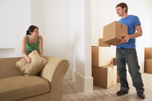Professional movers handling furniture in Barnes